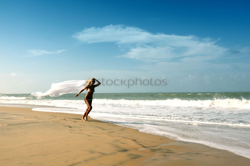 Similar – Woman with blue dress and hat at Malecon in Havana