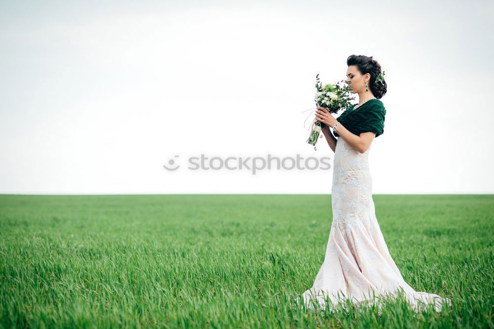 Similar – Woman in a green cornfield