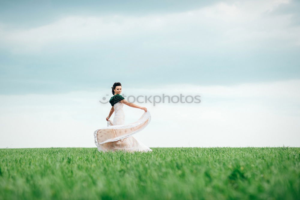 Similar – Woman in a green cornfield