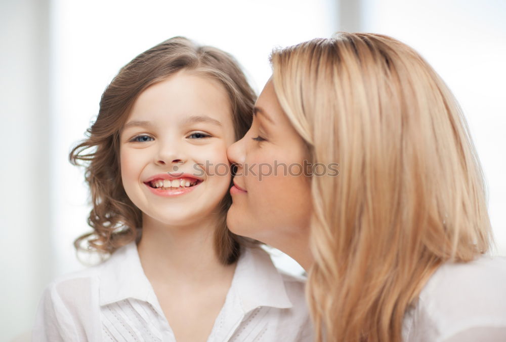 Similar – Image, Stock Photo Beautiful mother and daughter touching each other with their noses. Lovely family portrait