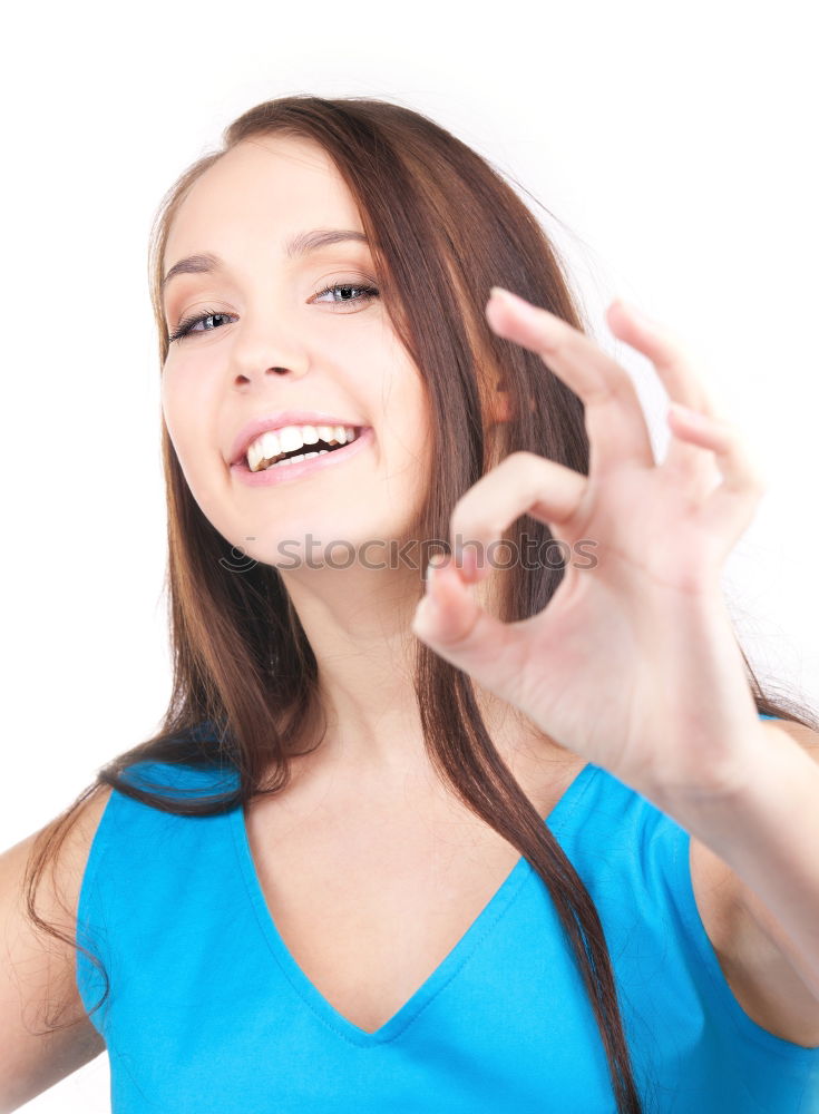 Similar – Portrait of a happy beautiful young redhead woman by a colorful wall