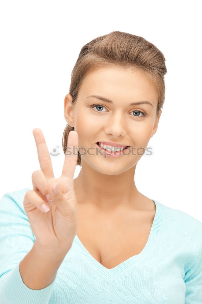 Young blonde woman showing the peace sign