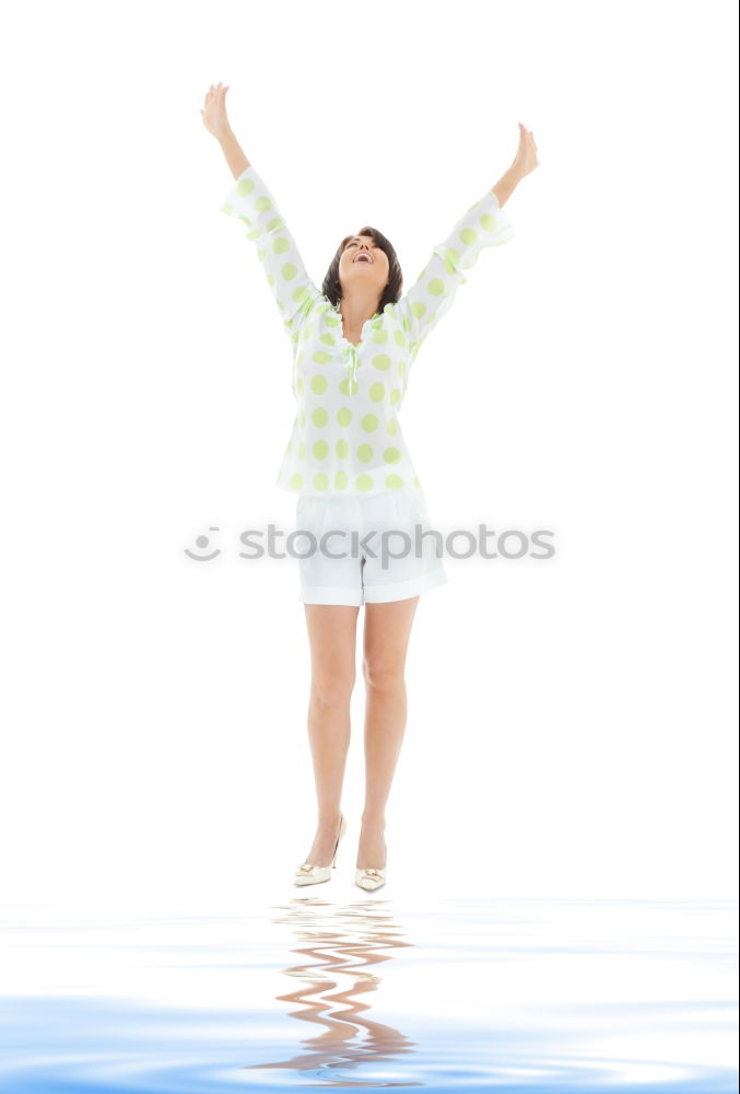 Similar – Mature brunette woman sunbathing by the pool with her feet in the water and a wrap around her body