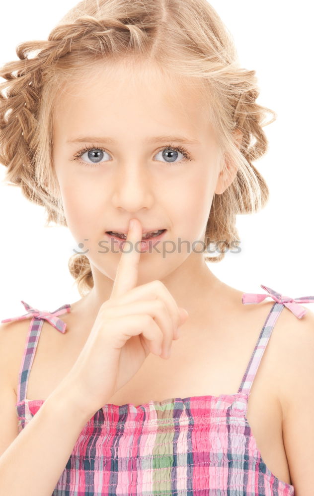 Similar – Young Girl Gesturing Silence.