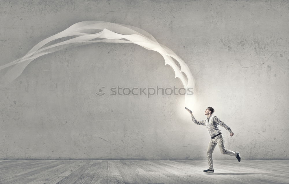 Similar – Person with surfboard standing near sea