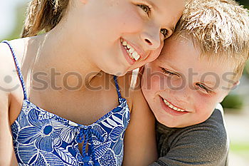 Similar – Image, Stock Photo Mother and son seated on a park