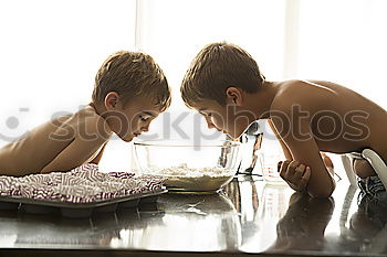 Similar – child girl playing checkers with her dad