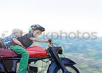 Similar – Couple taking a selfie on the motorcycle