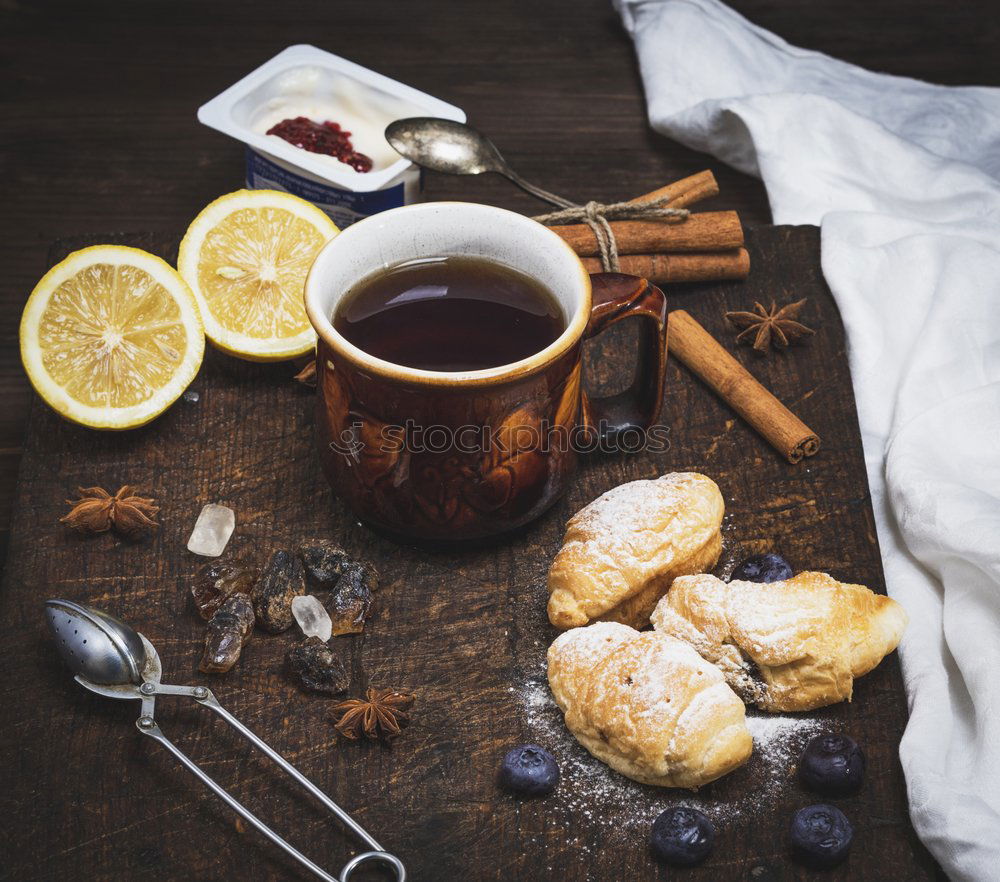 Similar – Image, Stock Photo Cozy winter morning at home. Hot tea with lemon