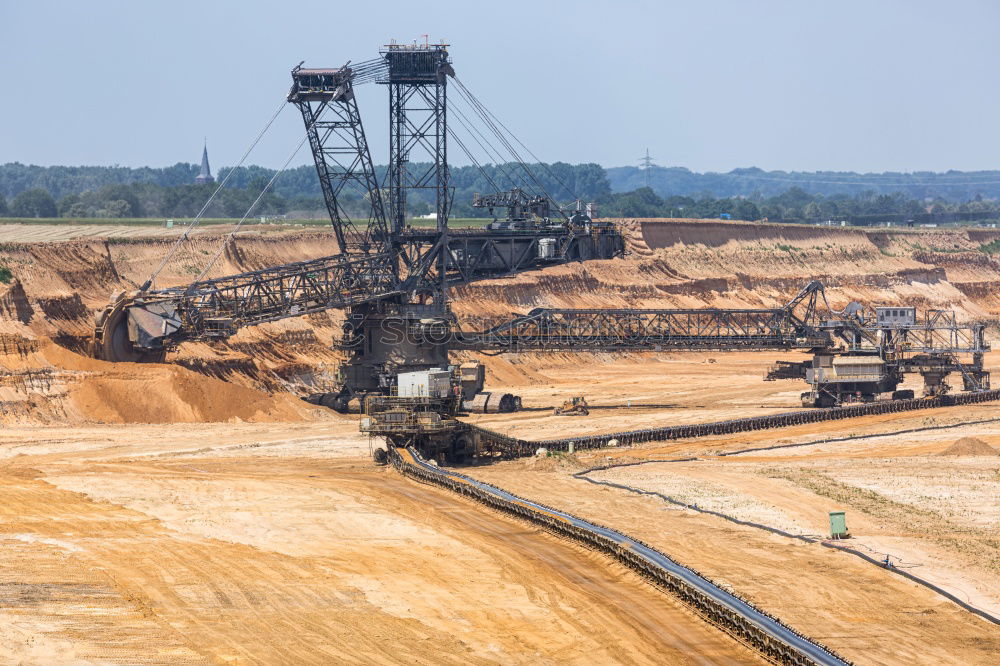 Similar – Opencast mining with conveyor crane