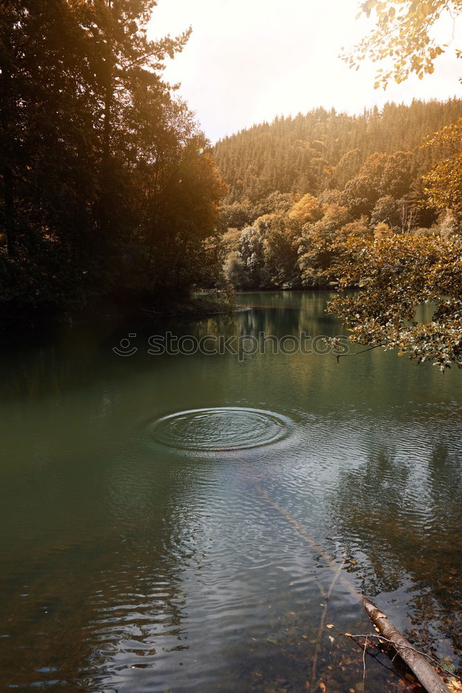 Similar – Lake in sunny mountains