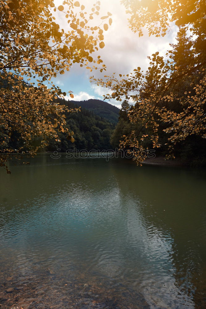 Similar – Lake in sunny mountains