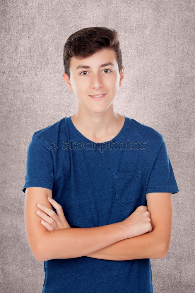 Attractive teenager guy in a park