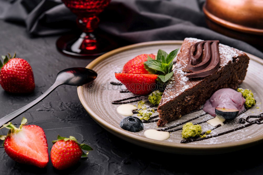 Similar – Image, Stock Photo Chocolate Tiramisu cake with strawberries on black slate