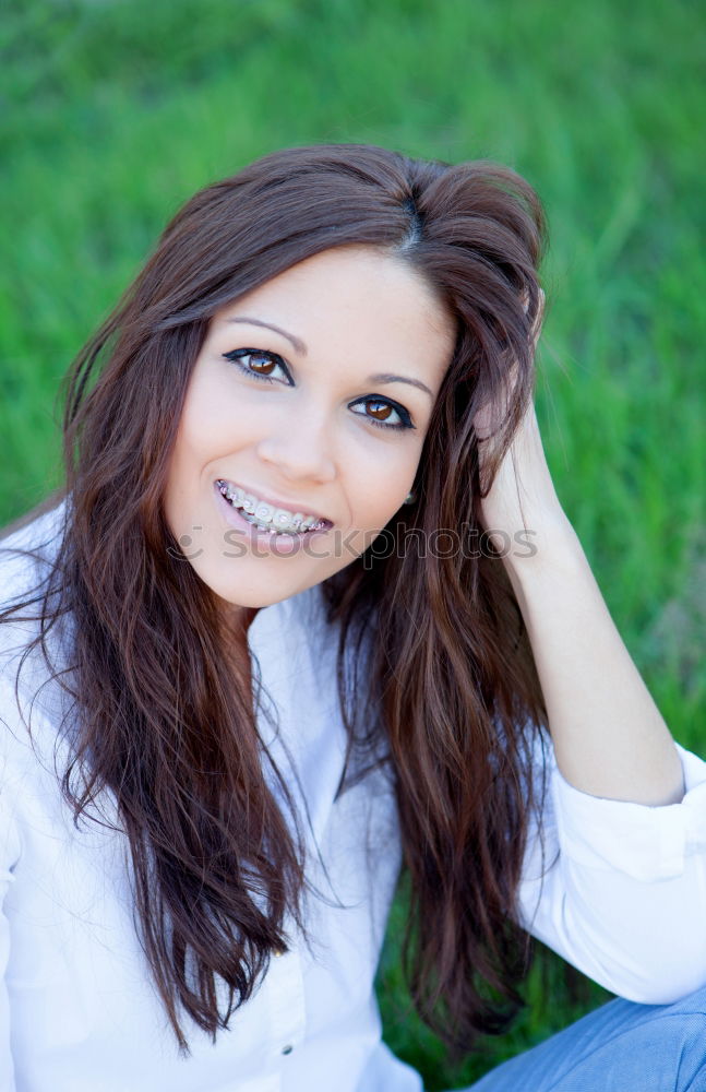 Young woman smiling in urban background