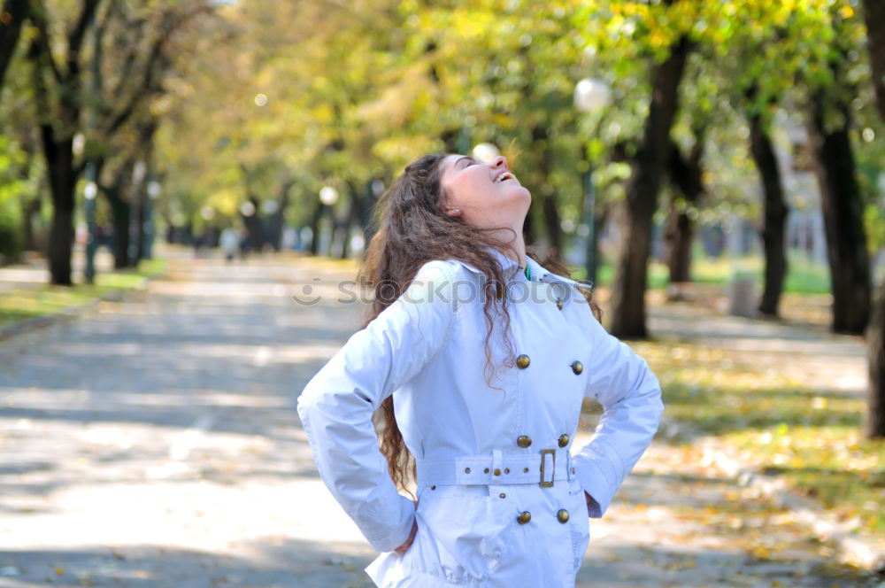 Similar – Woman enjoys sun on park bench