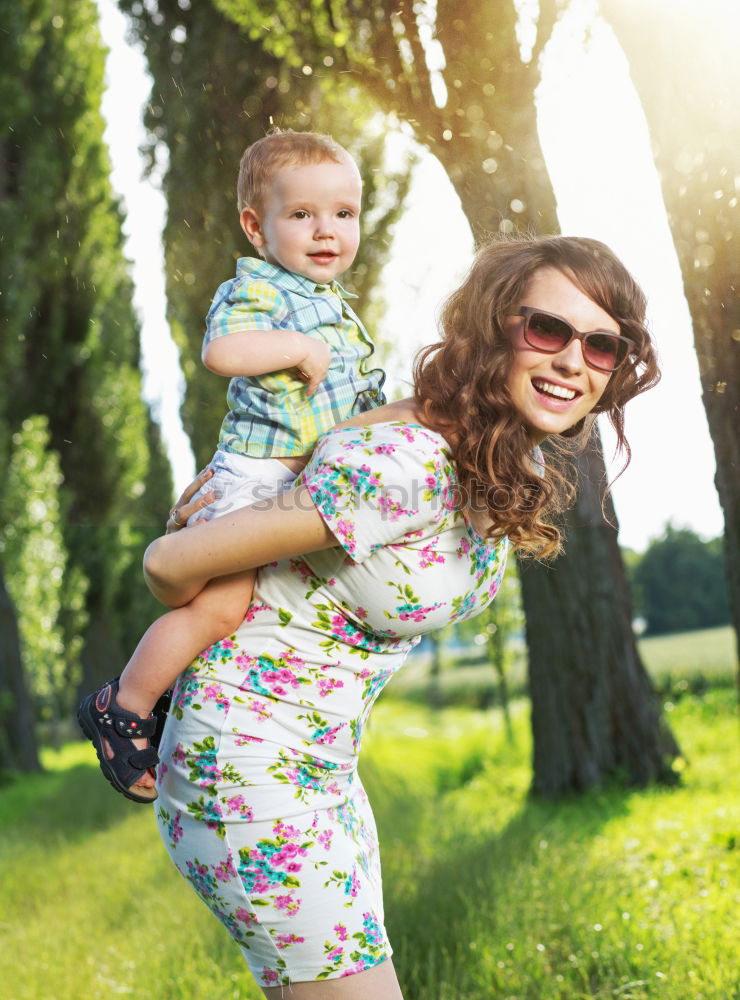 Similar – Image, Stock Photo Mother holding walking child