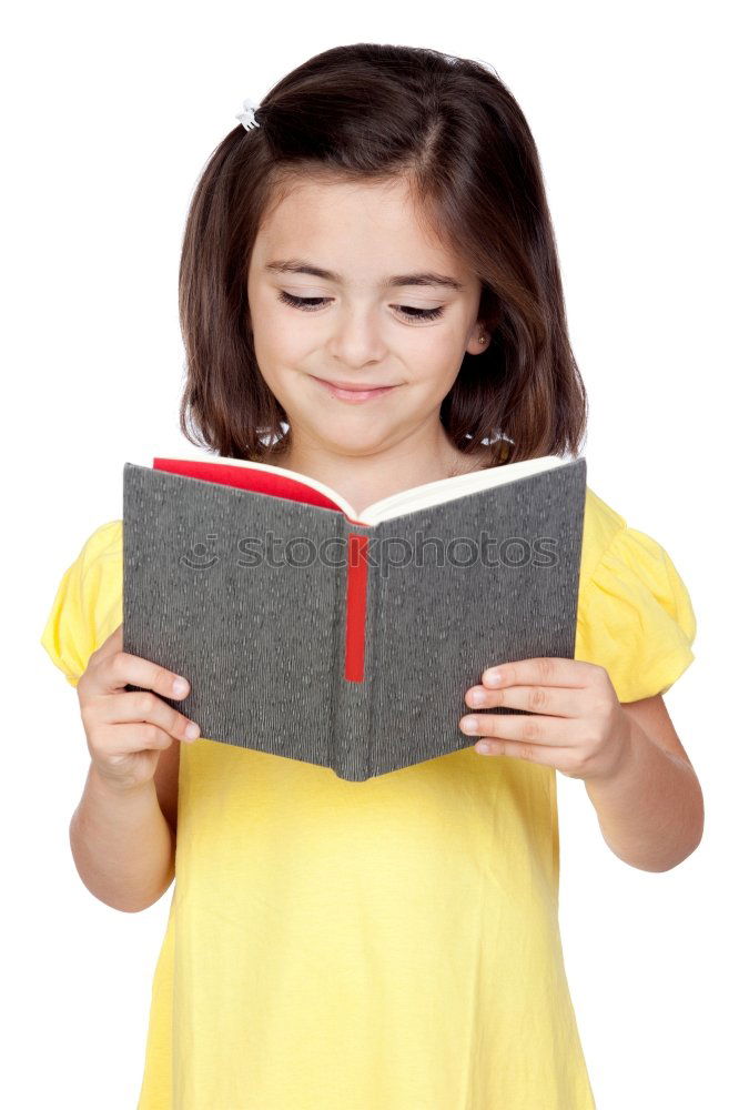 Similar – boy reading books on gray background