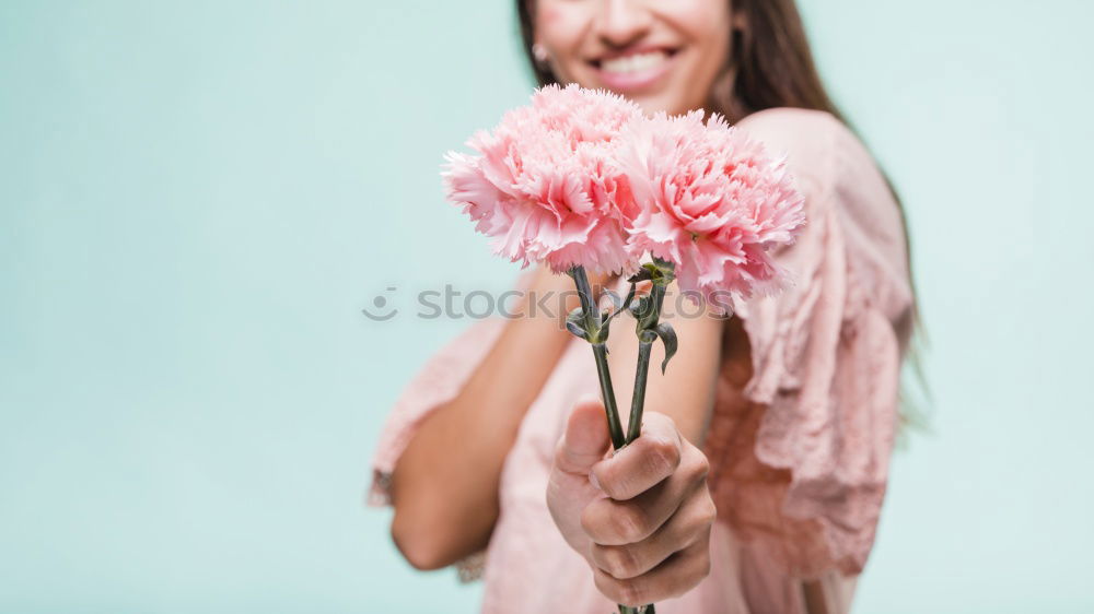 Similar – Young woman with pink hair is licking lollipops