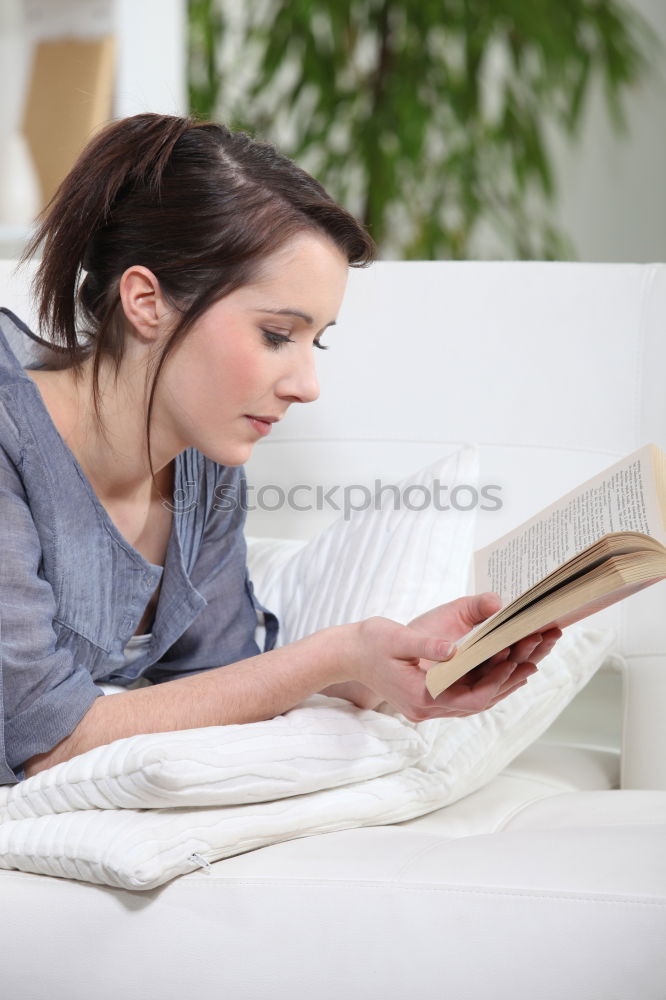 Similar – Image, Stock Photo Young woman on a train writing notes in a diary or journal staring thoughtfully out of the window with her pen to her lips as she thinks of what to write.