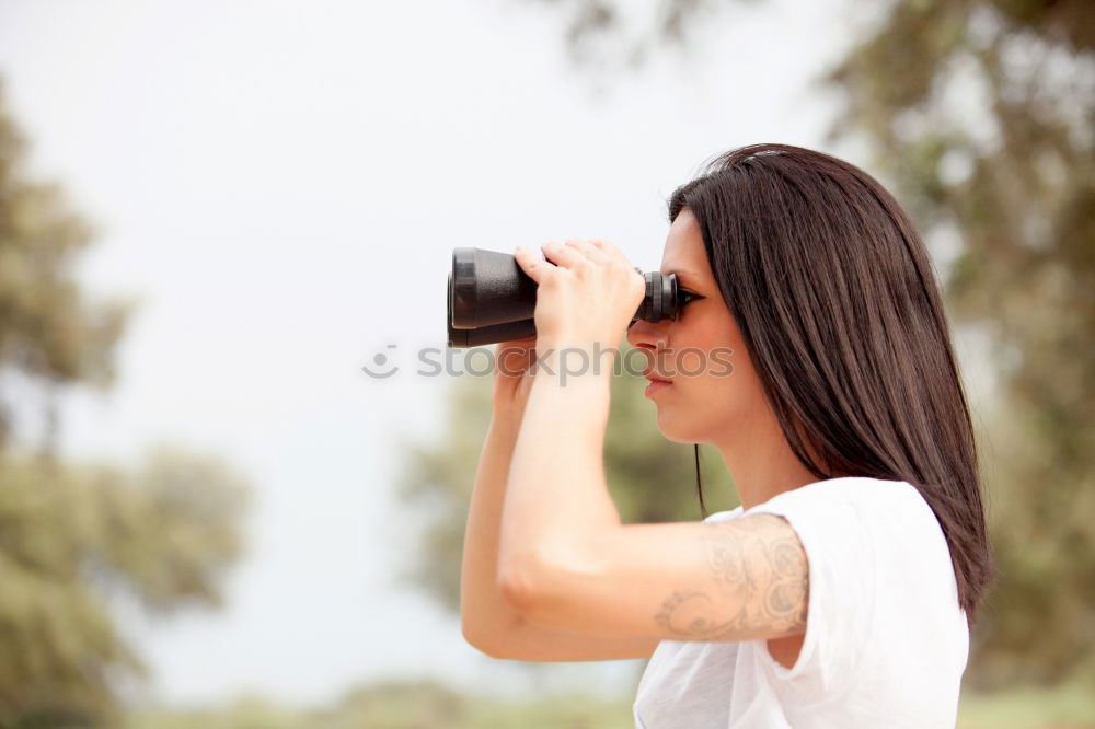 Similar – Image, Stock Photo Lady with camera on shore near stones and water