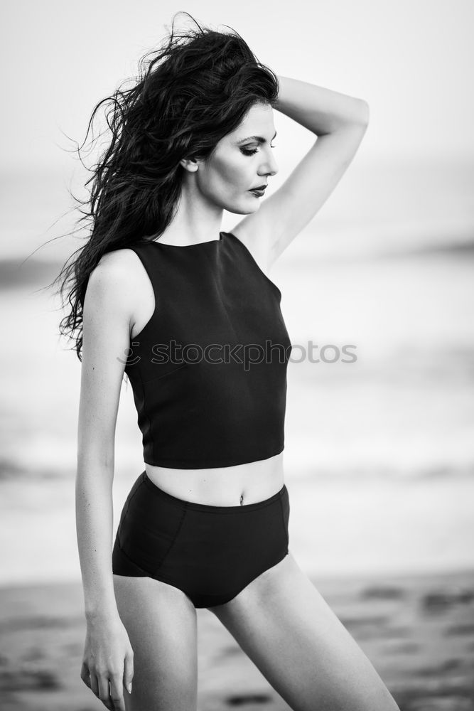 Similar – Young female african athlete on beach with soccer ball