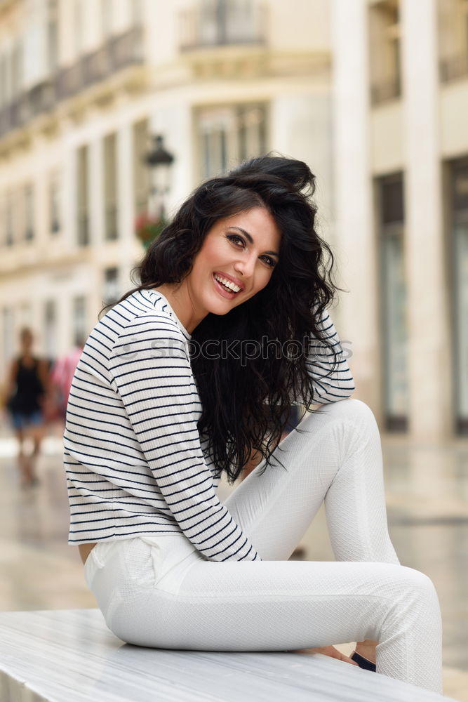 Similar – Smiling blonde girl with red shirt enjoying life outdoors.