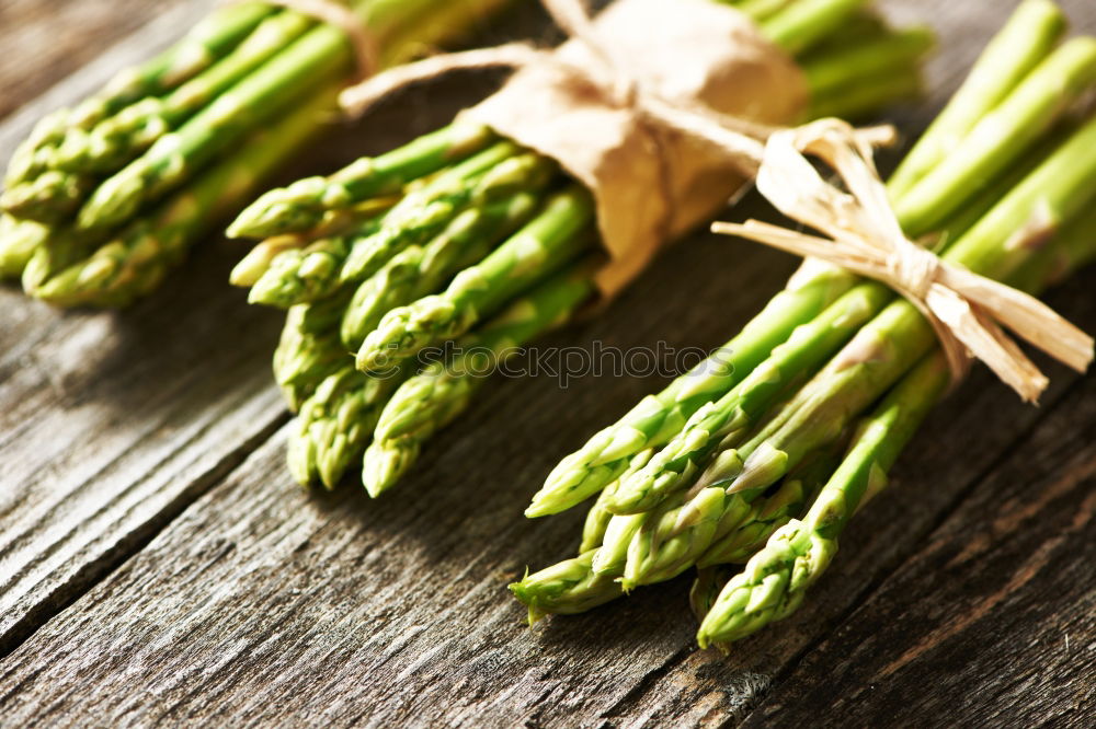 Similar – Image, Stock Photo Fresh asparagus with knife