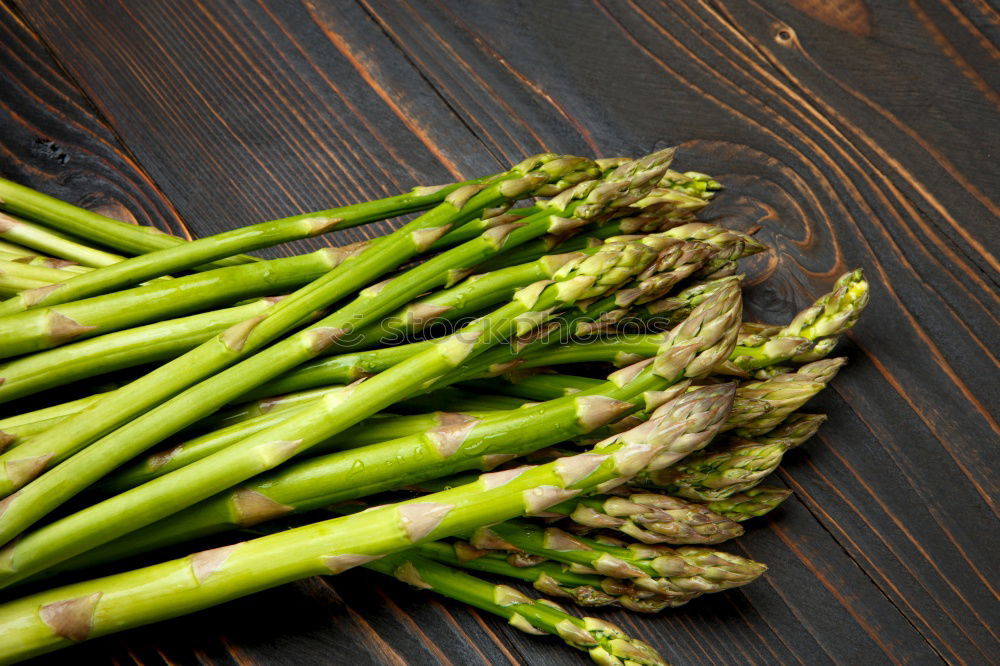 Similar – Image, Stock Photo Fresh asparagus with knife