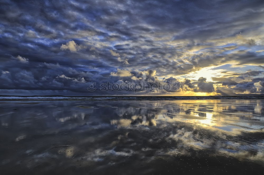 Similar – Image, Stock Photo purple sunrise over North sea beach and lighthouse, Texel