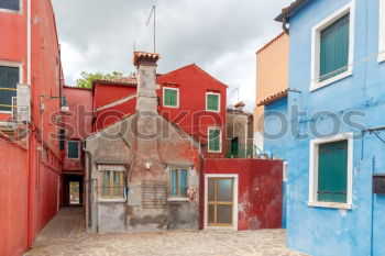 Similar – Image, Stock Photo Hung laundry on the lines in front of houses in Burano.