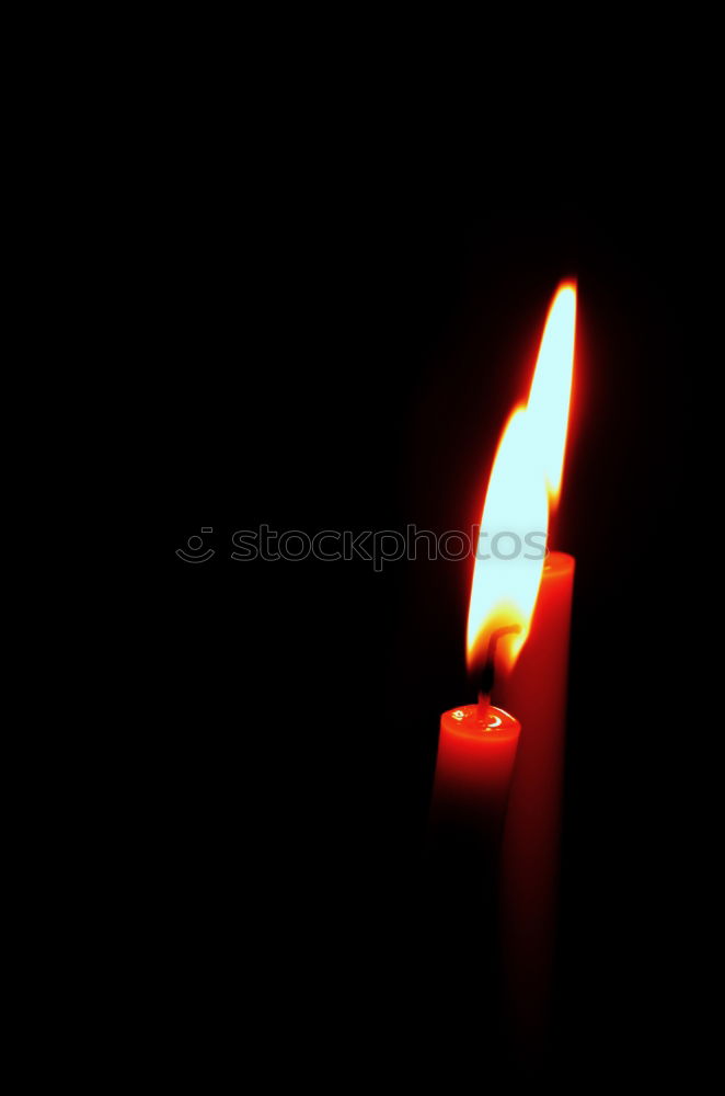 Similar – light a candle for Candle