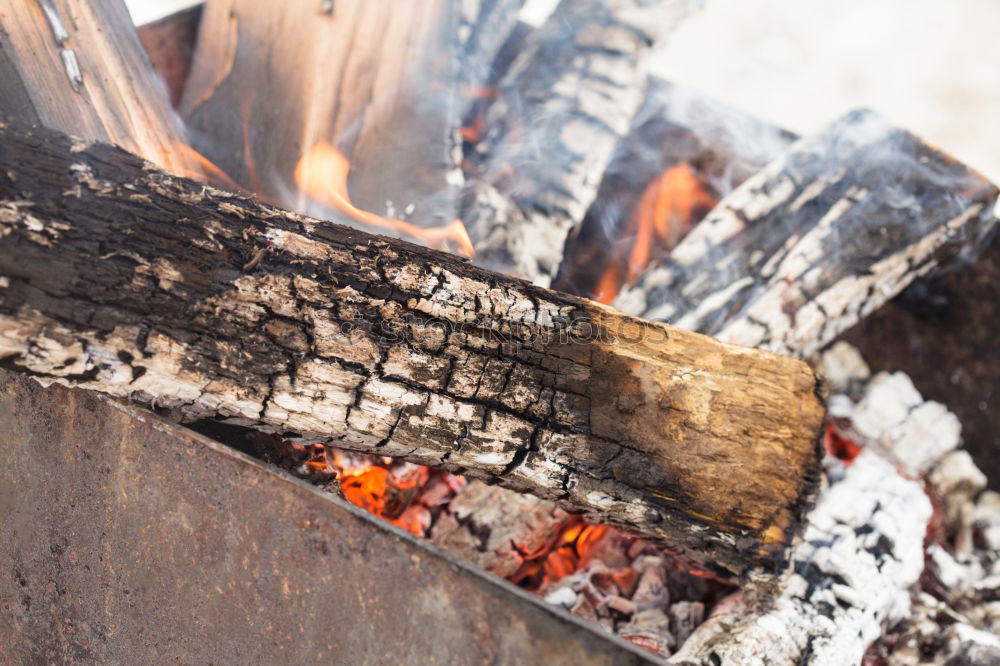 Similar – Hot coals with smoke in grill