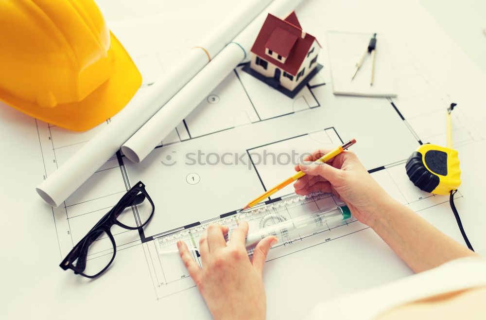 Similar – Image, Stock Photo Architect or planner working on drawings for construction