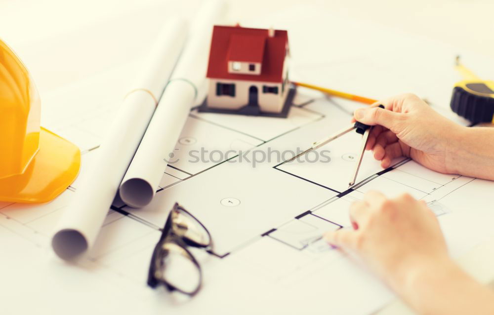 Similar – Image, Stock Photo Architect or planner working on drawings for construction