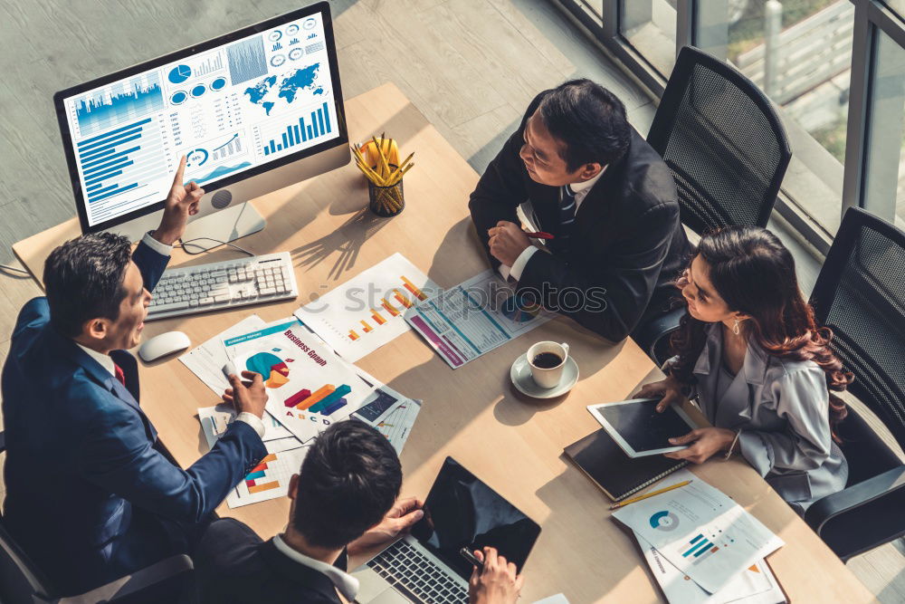 Similar – Group of young adults having a meeting in the office