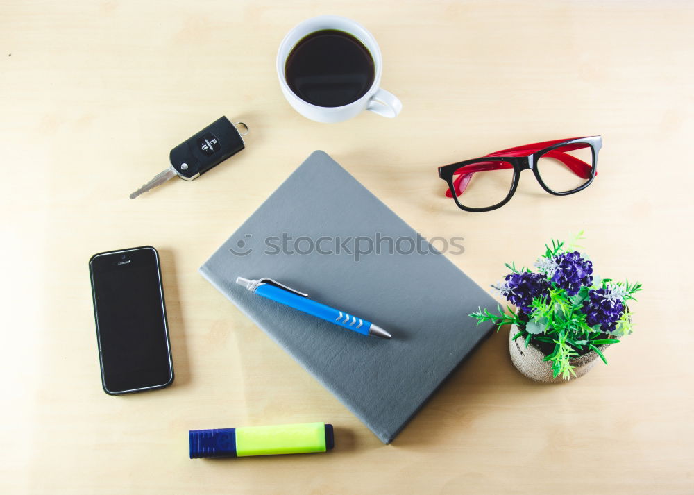 Similar – laptop, notepad, glasses and camera on the wooden desk