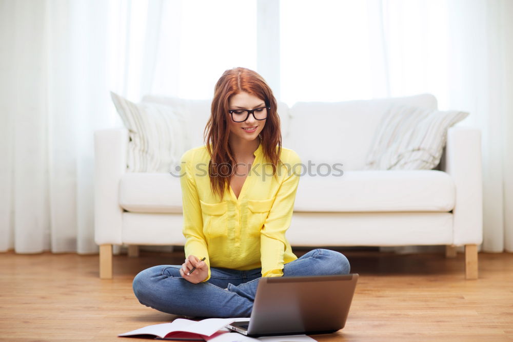 Similar – Mature woman sitting on couch at modern home