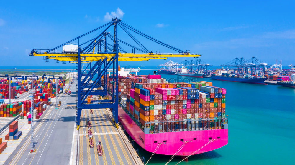 Similar – Container ship unloading in deep sea port, Global business logistic import export freight shipping transportation oversea worldwide by container ship in open sea, Container vessel loading cargo freight ship.