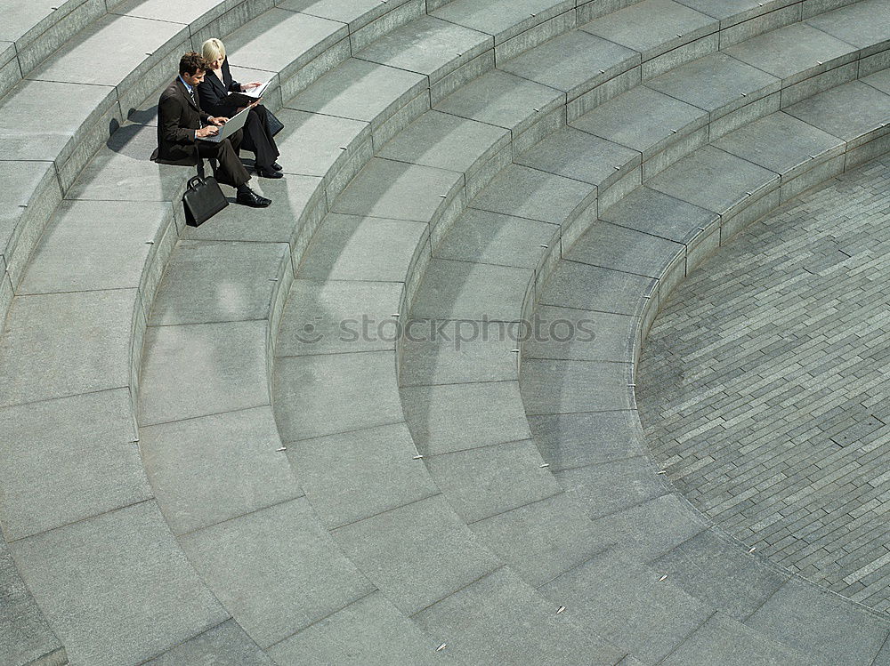 Similar – Image, Stock Photo elegantly dressed lady with black coat, red hat, red scarf and red pumps walks on a large square with concrete and patterned floor