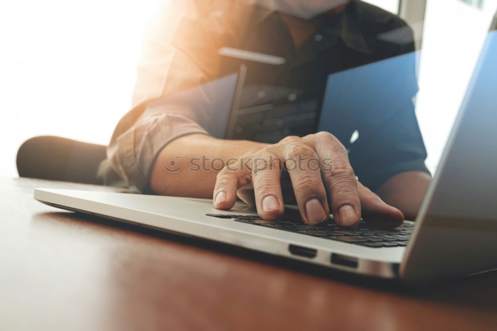 Similar – Close-up of women typing on keyboard on her laptop at home