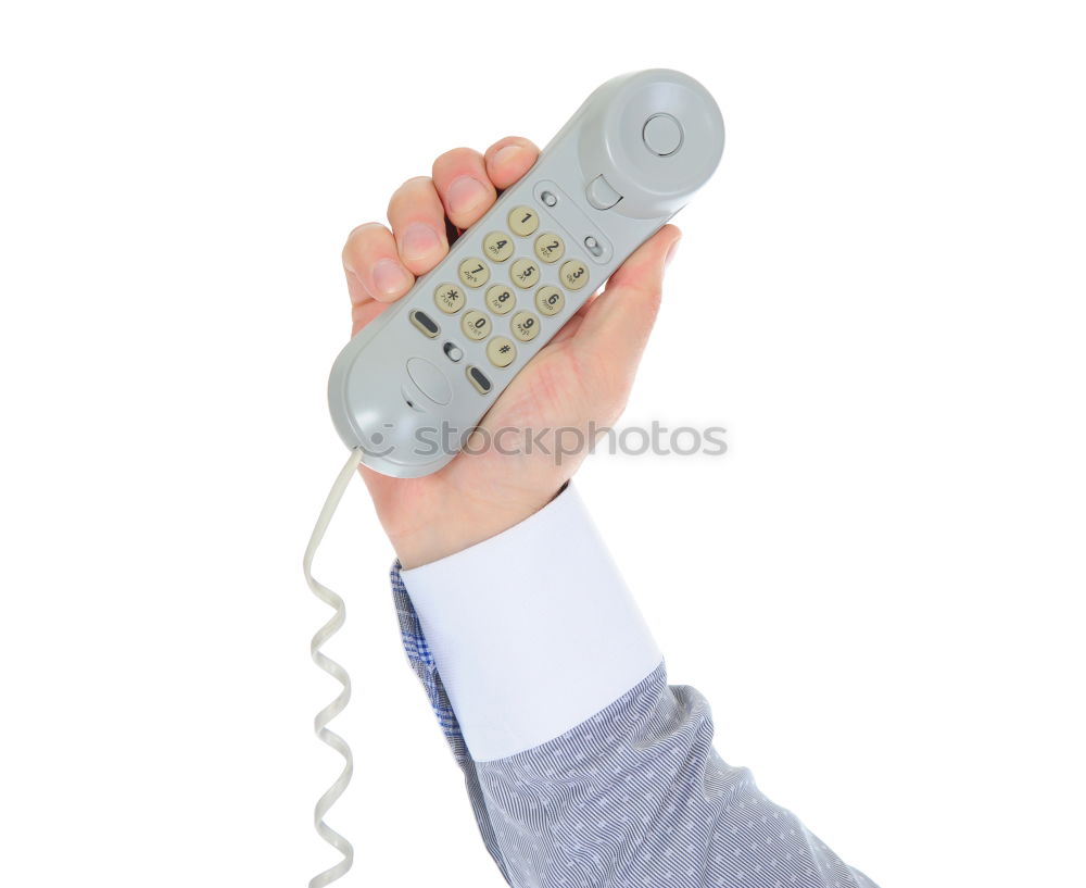 Woman answering an old retro telephone device. concept of changes in ways of communication