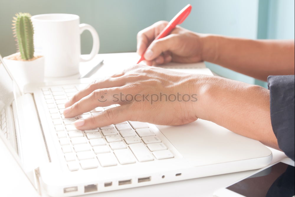 Similar – Woman measuring her own blood pressure at home.