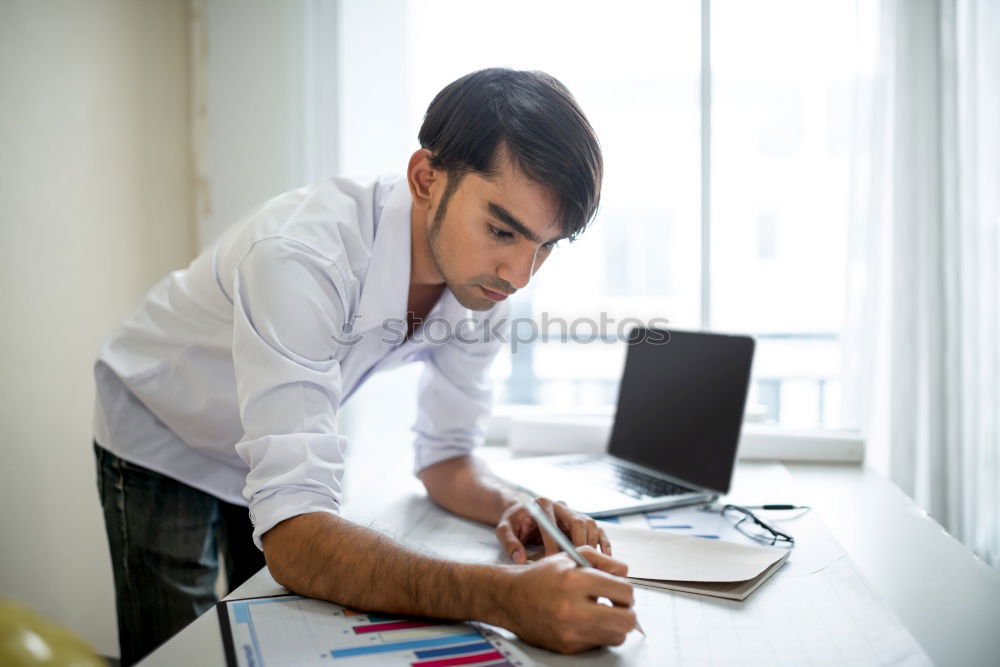 Similar – Image, Stock Photo Architect or planner working on drawings for construction