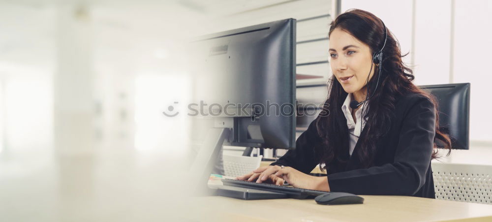 Similar – Concentrated young lady using laptop and sitting at table