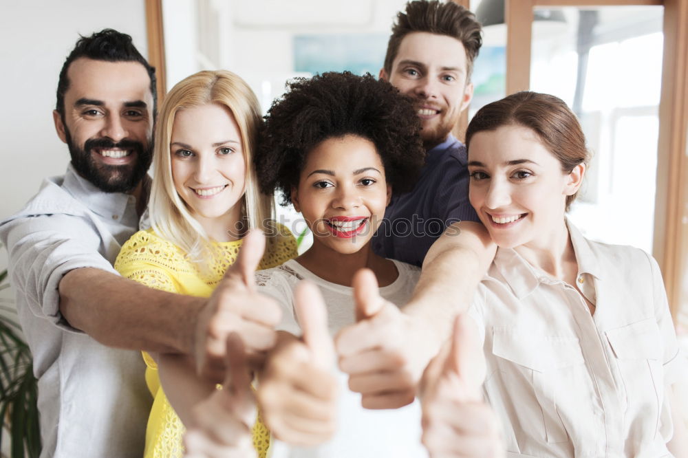 Similar – Image, Stock Photo Multiracial young people looking at a tablet computer