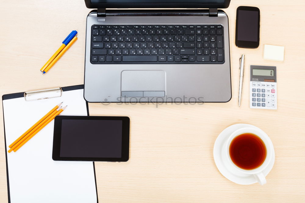 Similar – office wooden desk with pc keyboard and other supplies