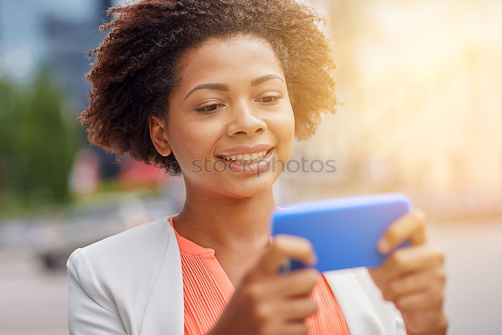 Similar – Black woman listening to the music with headphones