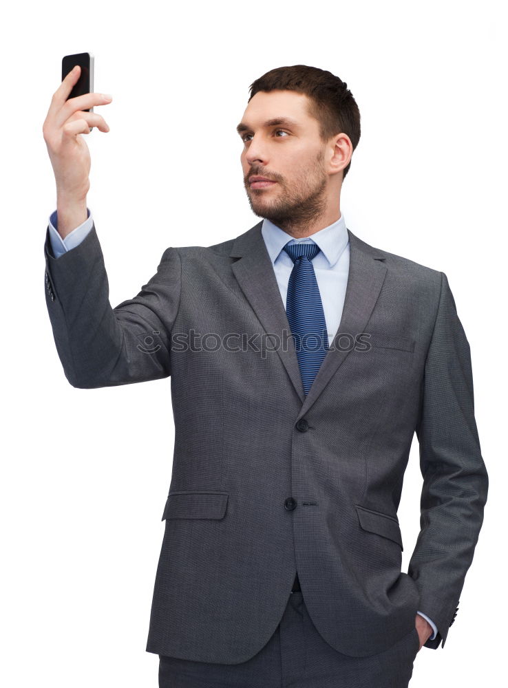 Similar – Image, Stock Photo Elegant Young Businessman in the Street Using a Mobile Phone