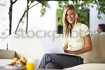 Similar – Image, Stock Photo Smiling African woman using digital tablet outdoors